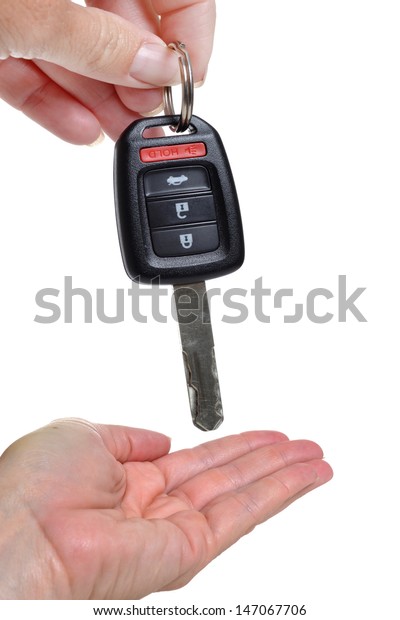 handing over the car\
key
