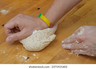 Hand-kneaded raw bread dough closeup isolated - Powered by Shutterstock