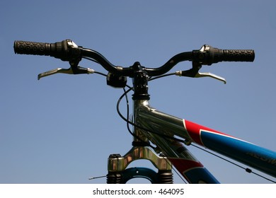 The Handle Bars Of A Mountain Bike