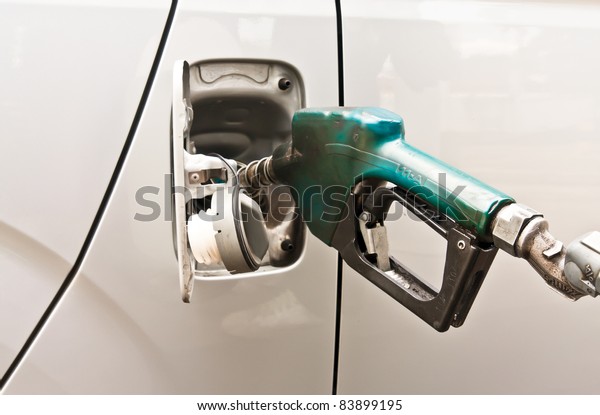 Handle of\
Dispensing fuel refueling petroleum into\
car