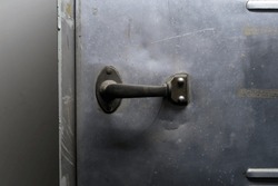 Handle On An Old Metal Door. 