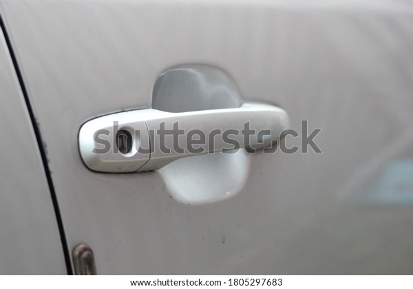 Handle for opening the car\
door.