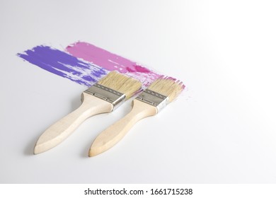 Paint​ brush​ handle, a​ wood​ top​ on​ white​ scene