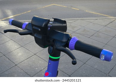 handlebars of the new electric scooter - Powered by Shutterstock