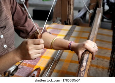 Handloom Weaver In India Working In Her Loom