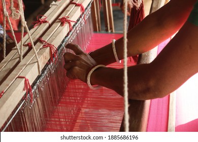 Handloom Weaver In India Working In Her Loom	