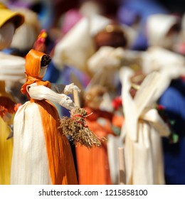 Handmade Appalachian Corn Husk Dolls/ People With Many Bright Colors. Closeup Shows Corn Husk Texture, Natural Dyes, And Quality Craftsmanship. Making Them Is A Tradition Passed Down By Generations.