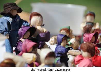 Handmade Appalachian Corn Husk Dolls/ People With Many Bright Colors. Closeup Shows Corn Husk Texture, Natural Dyes, And Quality Craftsmanship. Making Them Is A Tradition Passed Down By Generations.