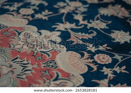 Handmade authentic Persian carpet featuring intricate floral and botanical motifs, ideal for traditional Oriental decor.


