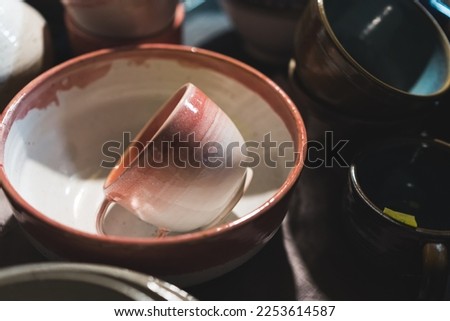 Handmade ceramics dinnerware set at handcraft market. High quality photo