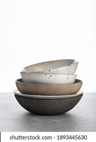 handmade ceramics, empty craft ceramic bowls on light background  - Shutterstock ID 1893445630