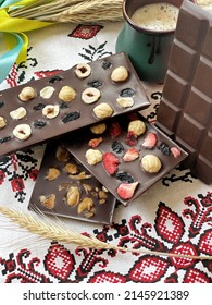 Handmade Chocolate Bar Decorated With Whole Hazelnuts, Almond And Sublimated Raspberry.Healthy Sugar Free Homemade Raw Chocolate With Cocoa.