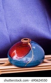 A Handmade Clay Pot Found In New Mexico Then Broken And Rejoined By Me Using The Japanese Art Form Of Kintsugi. This Has Room At The Top And Bottom For Text.