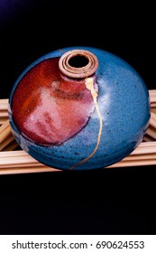 A Handmade Clay Pot Found In New Mexico Then Broken And Rejoined By Me Using The Japanese Art Form Of Kintsugi. This Has Room At The Top And Bottom For Text.