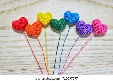 Handmade Crochet Heart On Wooden Background, Rainbow Color, Love Concept