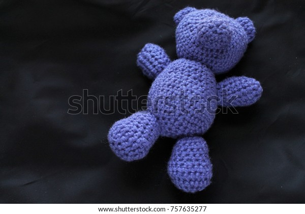 faceless teddy bear