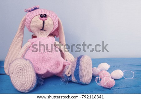 handmade easter bunny with colorful easter eggs