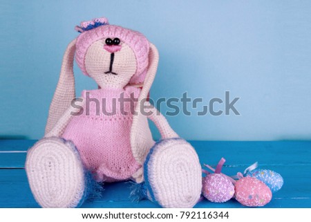 handmade easter bunny with colorful easter eggs