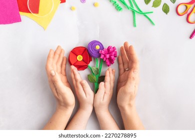 Handmade felt flowers craft with kids women's mother's day gift present hands - Powered by Shutterstock