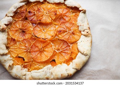 Handmade Fruit Galette On A Wooden Table. Sweet Pastries 