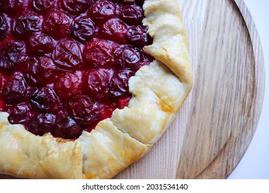 Handmade Fruit Galette On A Wooden Table. Sweet Pastries 