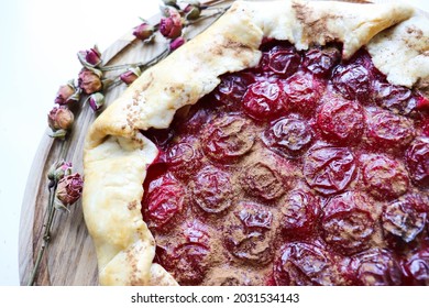 Handmade Fruit Galette On A Wooden Table. Sweet Pastries 