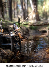 Handmade Gnome, Sitting Fishing In The Forest.