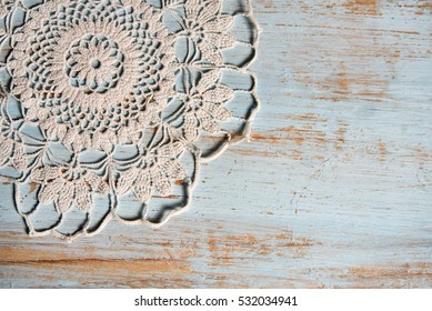 Handmade Lace On Shabby Chic, Painted, Blue Wood. Macrame Close-up, Top View With Copy Space. Wedding Or Holiday Background. 