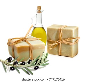 Handmade Natural Castile Soap And Olive Branch Or Twig Isolated On White Background