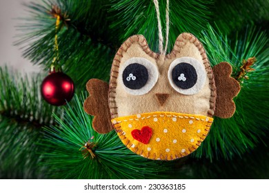 Handmade owl with big eyes from felt on Christmas tree - Powered by Shutterstock