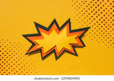 Handmade paper cutout pop art comic background with speech bubble. Cartoon flat style. In yellow and orange color.