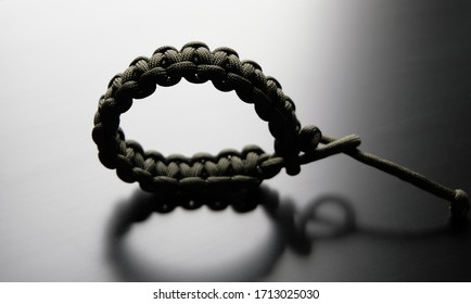 Handmade ParaCord Survival Bracelet close up - Powered by Shutterstock