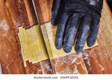 Handmade Pasta Cutting Close-Up in Kitchen - Powered by Shutterstock