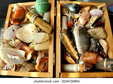 Handmade Rock, Crystal, And Shell Necklaces In A Jewelry Box