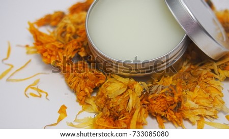 Handmade salves and balm using esential oils and dried calendula flower