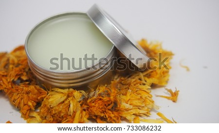 Handmade salves and balm using esential oils and dried calendula flower