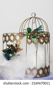 Handmade Sequined Beaded Accessory Brooch In A Shape Of Hummingbird Hanging On Decorative Bird Cage. Decoration Concept  Advertisement Of Handcraft Jewelry, Wallpaper. Embroidered Art Piece From Beads