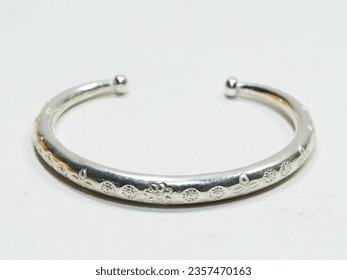 Handmade silver bangle on white background, Hmong Silver bracelet