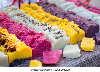 Handmade Soap Laid Out On The Counter Of The Store And Cut Into Pieces, Multi-colored Pieces Of Soap Close Up.