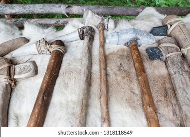 Handmade stone age axes in a row