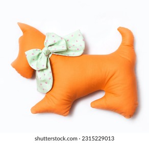 Handmade toy orange cat pillow with ornament isolated at white background - Shutterstock ID 2315229013