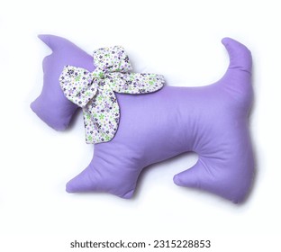 Handmade toy purple cat pillow with ornament isolated at white background. - Shutterstock ID 2315228853