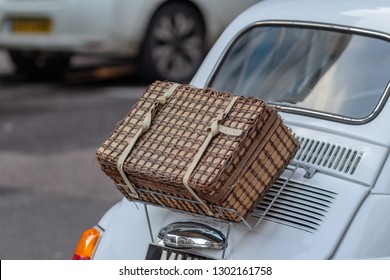 Handmade Wicker Picnic Basket Over White Car Boot