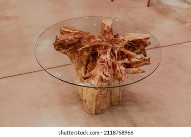 Handmade Wood Table Made Of The Dry Root Of The Tree And Round Glass Table Top. Tree Root Furniture