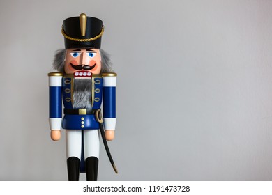 Handmade wooden Nutcracker Figurine - Soldier in blue Uniform, a typical Christmas Decoration - Powered by Shutterstock