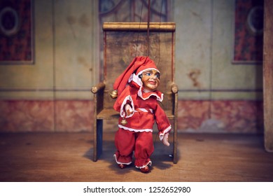 Handmade Wooden Puppet Theater. Jester And Royal Throne. Selective Focus