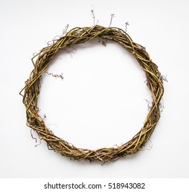 Handmade wreath of vines, blank for decoration. Festive round rustic wreath for Christmas or any holiday decor. Flat lay, top view, view from above
