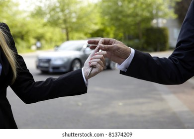 Hand-Over of Keys between two people