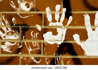 handprint on brick