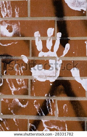 handprint on brick